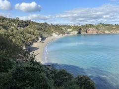 Looking down to St Mary's Bay, just after Sharkham Point - signs of civilisation!